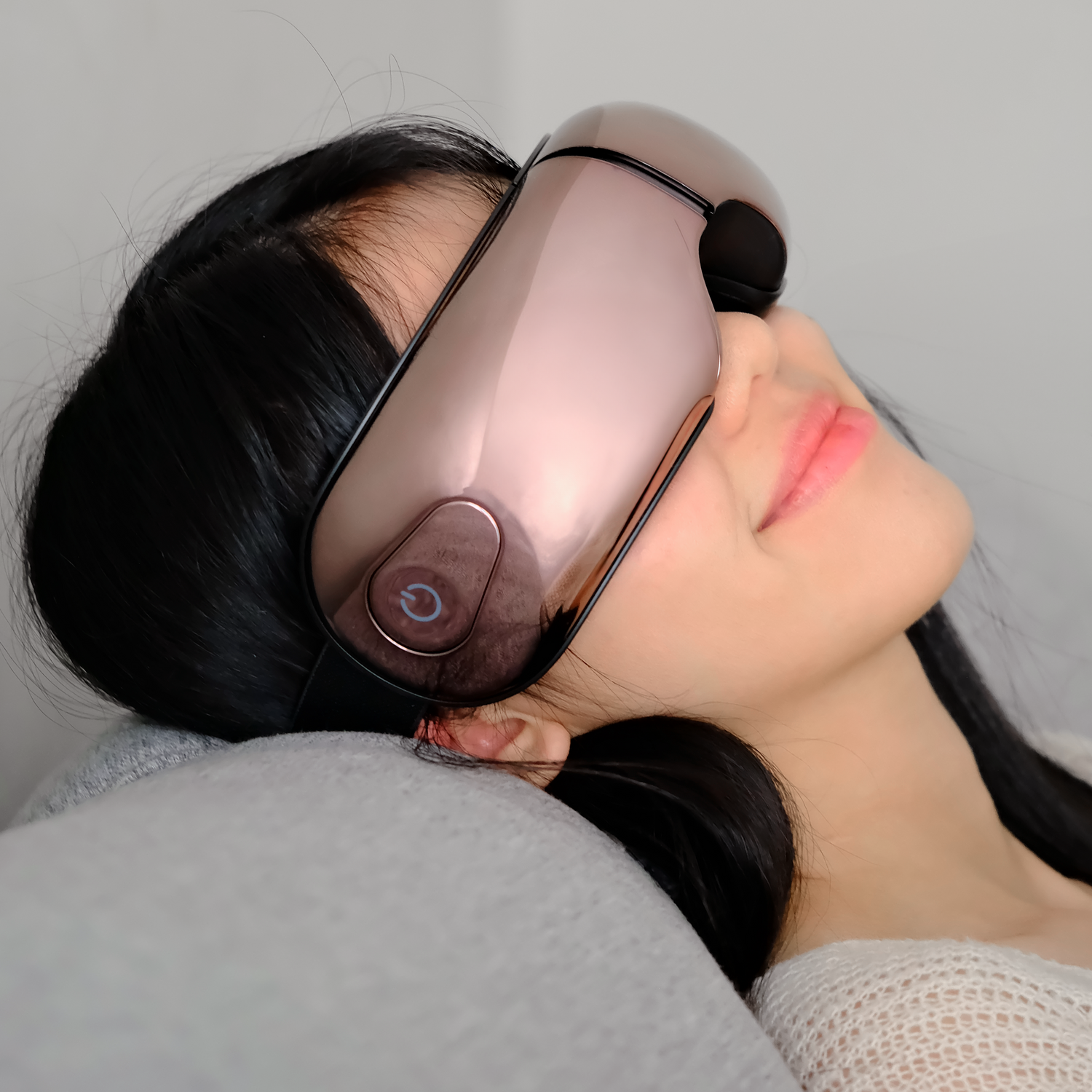 Lady resting with her iREST EyeWell Relaxing Massager